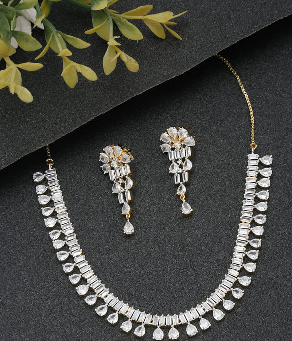 YouBella Jewellery Celebrity Inspired American Diamond Studded Necklace Jewellery Set with Earrings for Girls and Women (Gold) (YBNK_50543)
